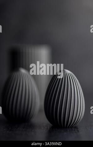 Easter decoration. Black eggs on a black background. Stock Photo