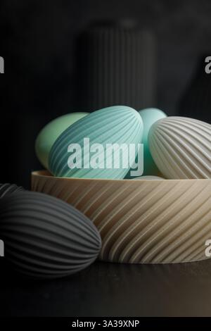 Easter decoration. Colorful eggs in bowl on a black background. Stock Photo