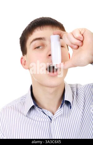 Teenager using Inhaler Isolated on the White Background Stock Photo