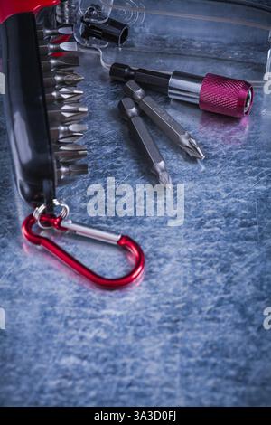 Threaded bit set in box on metallic surface construction concept Stock Photo