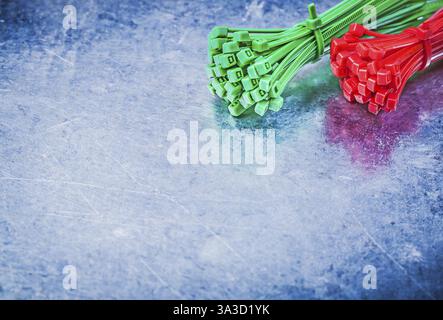 Variation of self-locking cable ties on metallic background construction concept Stock Photo