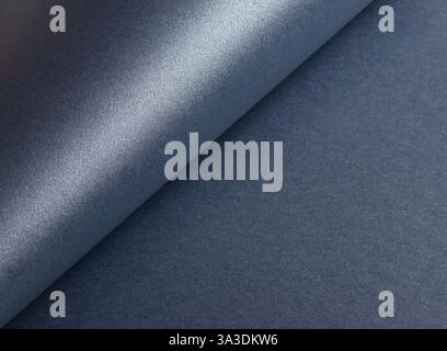 Pearlescent blue paper texture with a glossy, shimmering effect and fine grainy surface. Elegant and reflective premium sheet, perfect for luxury deco Stock Photo