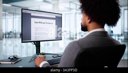African American man filling out legal documents online, signing digitally. Stock Photo
