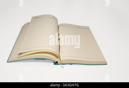 open blank paged journal book  with ribbon book mark  isolated on a white background Stock Photo
