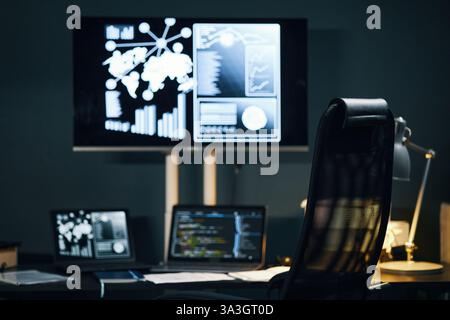 Displaying Data Interactive Screens and Computer at Office Desk Stock Photo