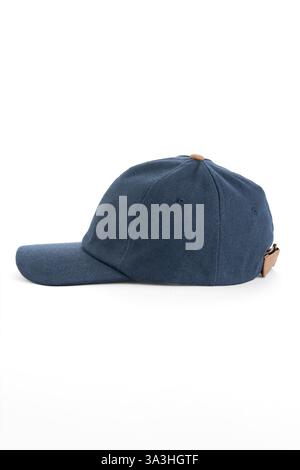 Blue textile baseball cap with brown elements, left side view, on white background Stock Photo