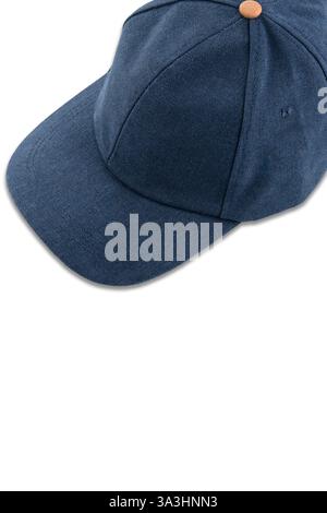 Blue textile baseball cap with brown button, top view, on white background Stock Photo