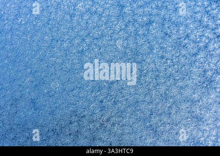 Texture of frozen glass in hoarfrost Stock Photo