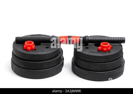Black red dumbbells isolated on white background. Sport equipment Stock Photo