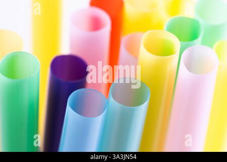 Colorful drinking straws on white background. Selective focus Stock Photo