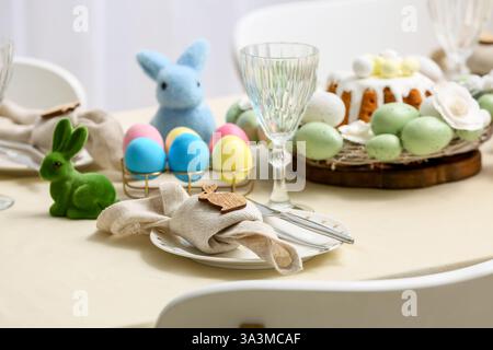Table setting with Easter eggs, closeup Stock Photo