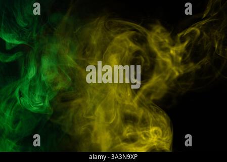Green steam on a black background. Copy space. Stock Photo