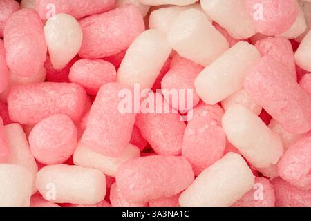 Pink and white box filler as a background. Top view. Stock Photo