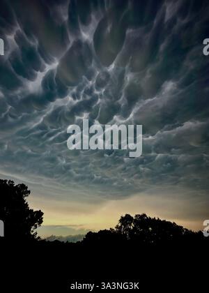 Mammatus Clouds precede an approaching storm. Stock Photo