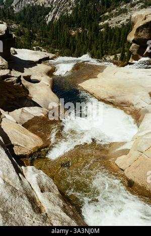 Rushing Water Over Smooth Granite in Yosemite National Park Stock Photo