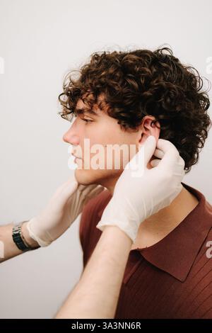 Otoplasty for changing the shape, position or size of the ears. Surgeon ...