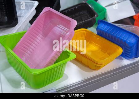 Samples of empty plastic boxes for lunch on the showcase. Industry Stock Photo
