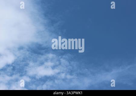 blue sky and white light clouds, a clear sky with white clouds Stock Photo