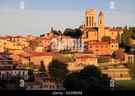 View on the mediaeval village La Turbie under warm light sunset, Cote d'Azur, France Stock Photo