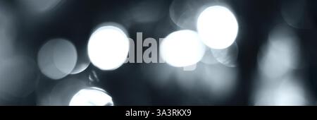 Blurred lights, gray, deep blue background, banner texture. Abstract bokeh with soft light header. Wide screen wallpaper. Panoramic web banner with co Stock Photo