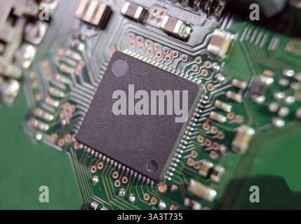 The use of semiconductor materials in modern electronic. Focused on microchip. Stock Photo