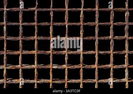 Old, heavily rusted and weathered metal grid Stock Photo