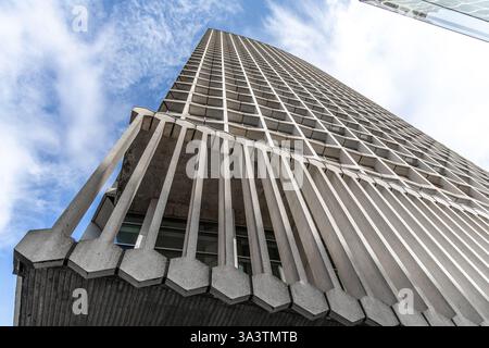 Centre Point near Tottenham Court Road tall brutalist grid facade in central London. Stock Photo
