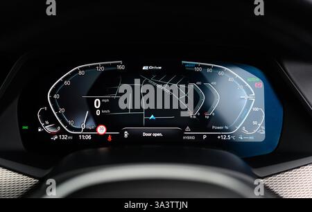 Virtual Cockpit, Digital Dashboard Displaying Map and Information About a Vehicle in Front of the Steering Wheel Including a Speedometer, Dials, Navig Stock Photo