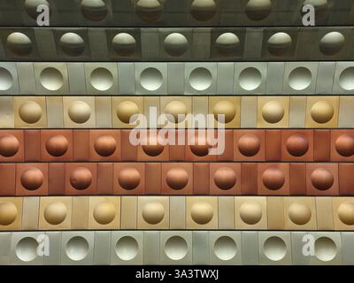 Fragment of a colorful geometric structure of an architectural element as an unusual background. Spherical convex and concave patterned figures Stock Photo