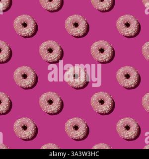 Pattern with pink donuts on the violet background Stock Photo