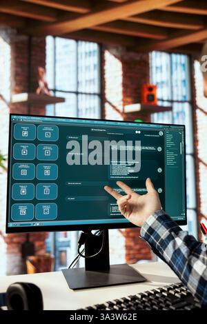 Freelancer in apartment uses large language model generative AI chatbot engaging in humanlike interactions. Remote employee solving tasks with artificial intelligence LLM handling user requests Stock Photo