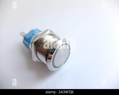 Power button with word and circular green backlight and metall button on white background Stock Photo