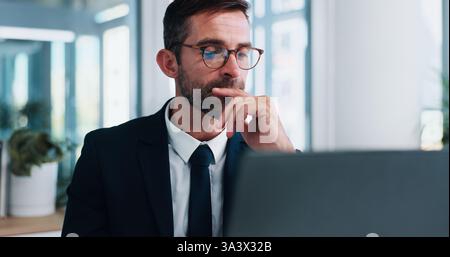 Business, thinking and man with solution, laptop and internet with decision, email and tax report. Financial advisor, investor and employee in Stock Photo