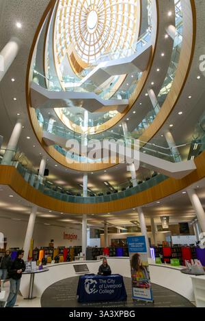 Soaring modern elliptical atrium in the Central Library building, city of Liverpool, England, UK Stock Photo
