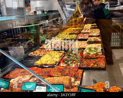 Rome, Italty - March 2025 - Street food , Pizza shop, pizzeria al taglio Stock Photo
