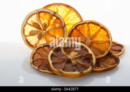Dried sliced orange. Decorative slices of orange. Historically exotic for Christmas wreaths and other decorations. Stock Photo