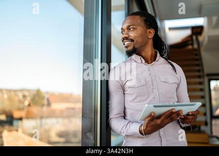 Happy software developer man working on project. Programming advanced code artificial intelligence Stock Photo