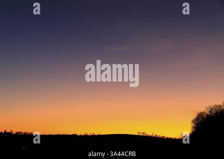 Gradient in the evening sky from orange to violet to dark blue, after sunset, Meissen, Saxony, Germany, Europe Stock Photo