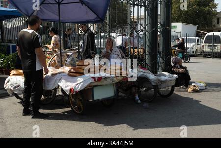 Samarkand, Uzbekistan October 1 2024: a pita or lepeshka is on sale in Siyob bazaar or so called Siab bazaar is the biggest bazaar in Samarkand. Stock Photo