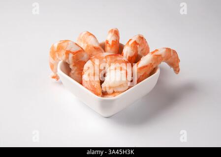 Top view of shrimps on a plate isolated on white background Stock Photo