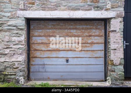 Rusted grey garage door Stock Photo