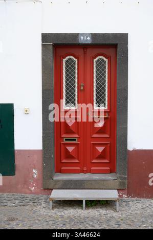 Painted ed door in Old Town, Funchal, Madeira, Portugal Stock Photo