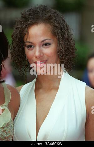 Naomi Russell May 2001 Actress in Barbados Wearing bikini with sea