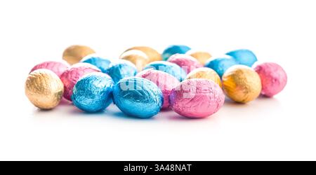 Chocolate easter eggs wrapped in multi colored foil isolated on a white background. Stock Photo