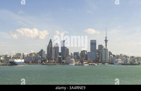 Skyline with modern skyscrapers and harbour against a blue sky Auckland, New Zealand, Oceania Stock Photo