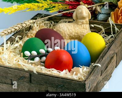 painted eggs in different colors, butter lamb, Easter palm and other elements, background, wallpaper Easter theme Stock Photo