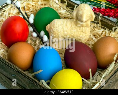 painted eggs in different colors, butter lamb, Easter palm and other elements, background, wallpaper Easter theme Stock Photo