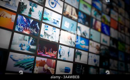 Media concept video wall with small screens, streaming service or VOD concept Stock Photo