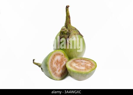 Cross section of a golf ball-sized Thai eggplant with whole berry (Solanum melongena), isolated on white background, clipping path Stock Photo