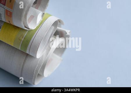 Roll of newspapers, copy space. Stock Photo